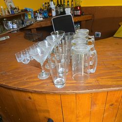 Beer mugs martini and shot glasses