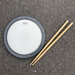 Remo Drum Practice Pad & Drum Sticks