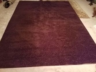 Rug; 90 in  x 120 in; eggplant color with leaf imprints  - $85