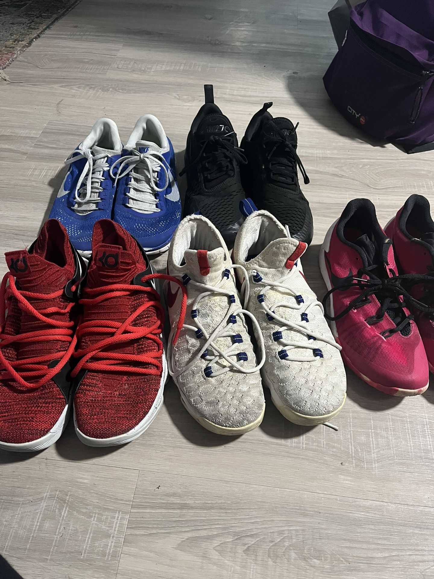 A Couple Pairs Of Shoes For Sale View Photos