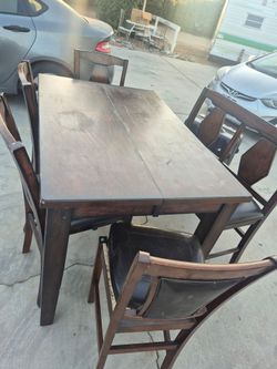 Table 3 chairs 1 bench chair