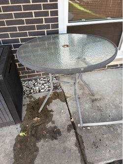 32” glass top table.
