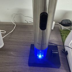 Secura Electric Wine Opener, Stainless steel electric wine opener with charging base.
