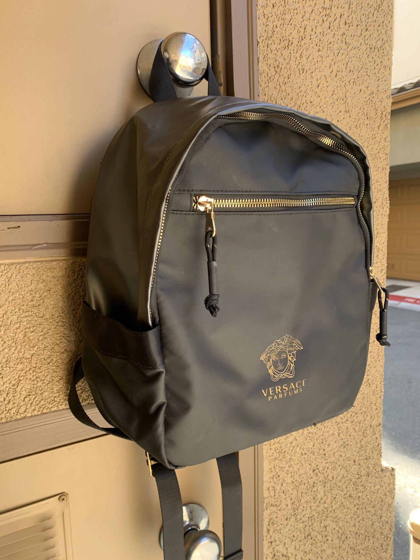 Women’s Purses And Versace Backpack 