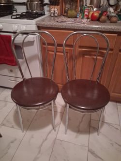 2 new chrome chairs leatherette seats.