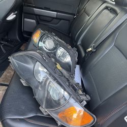 2005 BMW 325ci Head Lights One