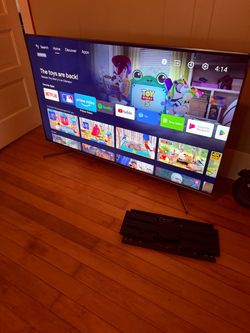 Sony XBR-65X950G 65 in 120hz 4k TV with 2 remotes, stand and pre installed wall mount