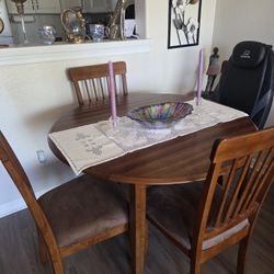 Berringer Brown Dining Drop Leaf Table and Four Chairs by Ashley Furniture 