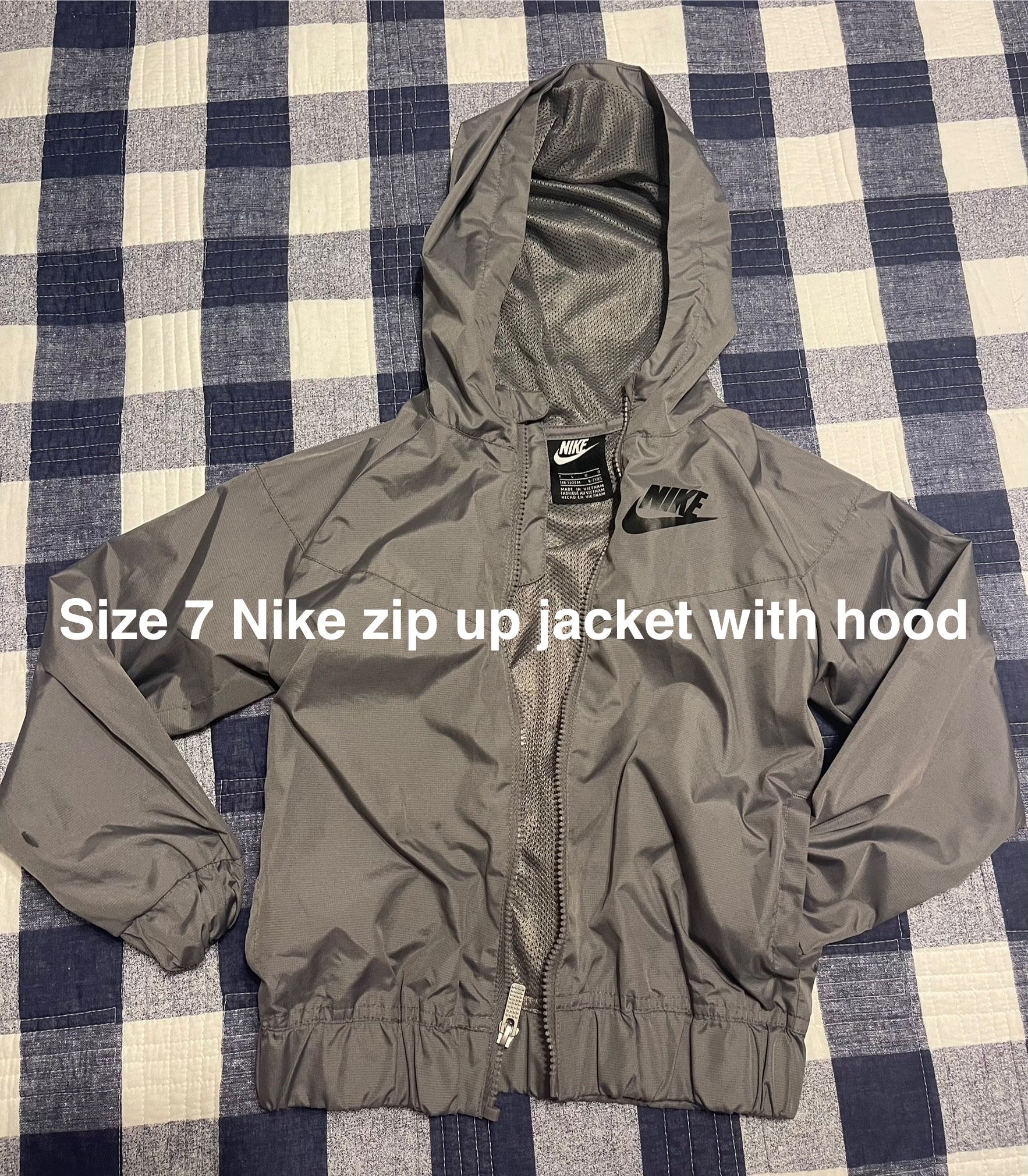 Nike- size 7, zip up jacket with hood