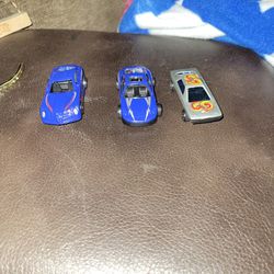 Three toy cars