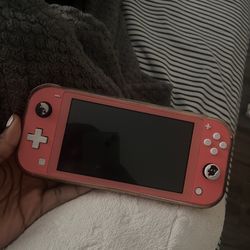 Nintendo Switch Lite (Coral Pink) + Game & SD Card Bundle