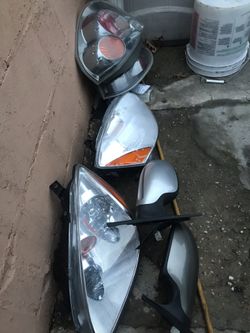 2006 Nissan Altima to headlights Tail light. And left and right Miror