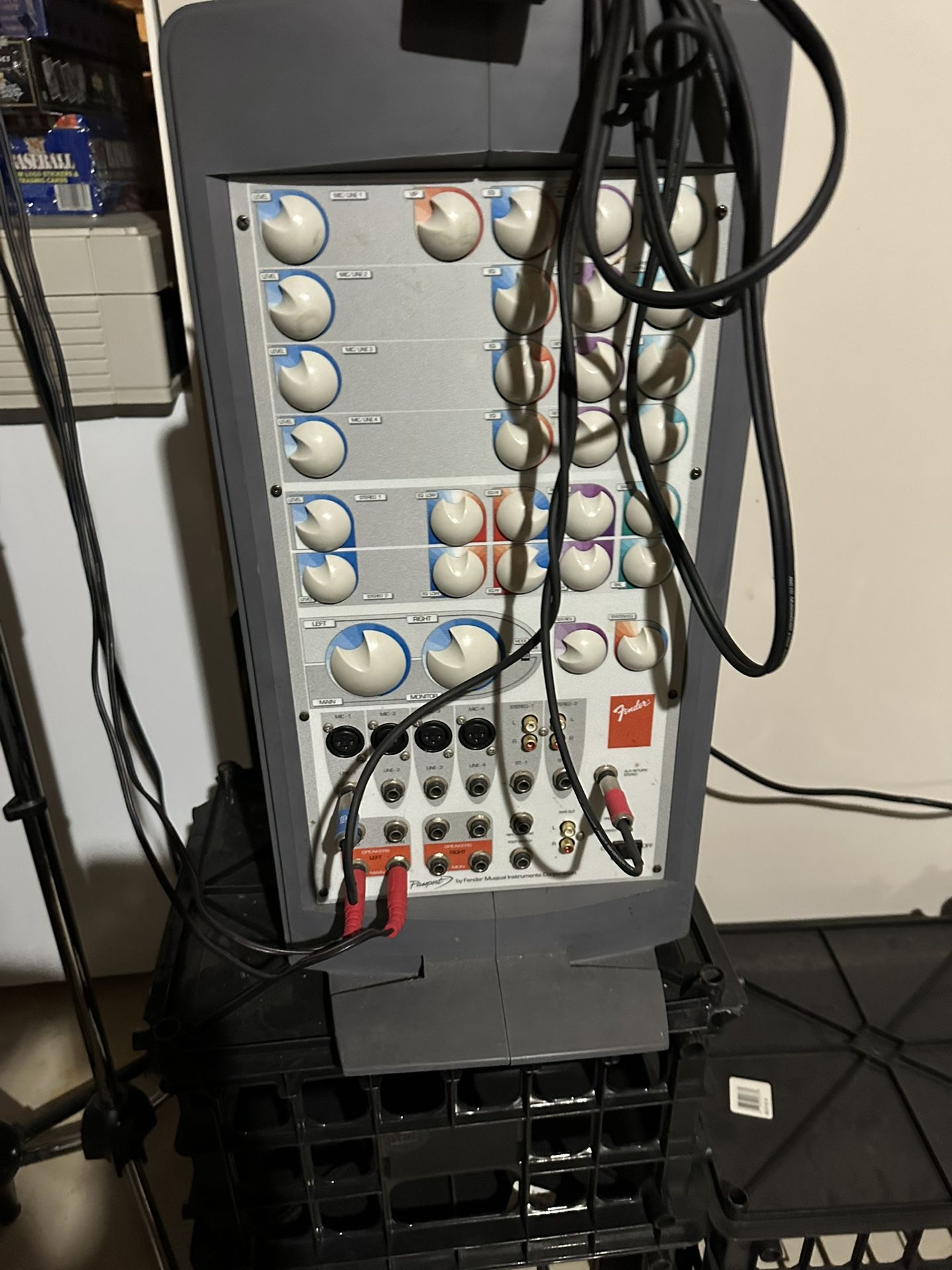 Fender audio mixer with multiple inputs and controls.