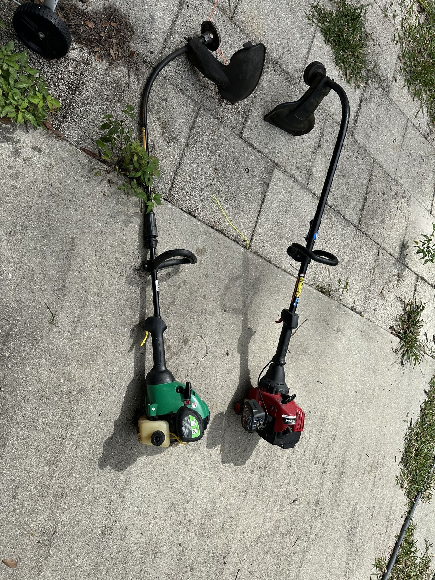 2 WEEDEATERS ( NEED REPAIR)