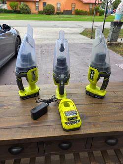 3 Ryobi One+ multi surface handheld vacuums with batteries and charger
