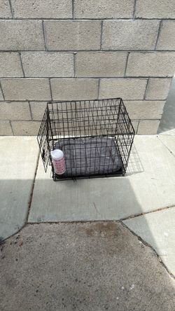 Medium to small Dog crate.