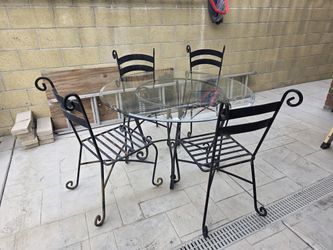 Iron Table With 4 Chairs, Glass Is 4 Ft Wide, 1/4 " Thick
