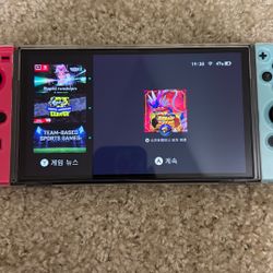 nintendo switch oled and game