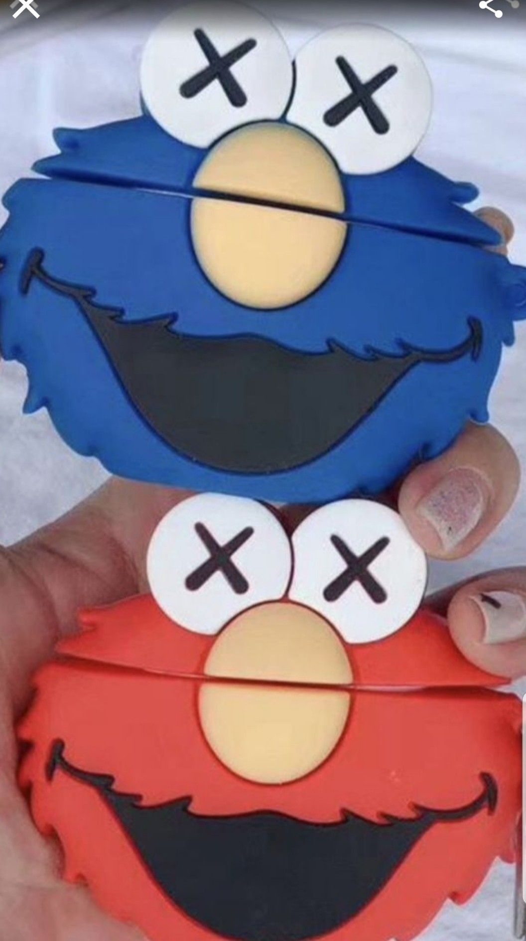 Kaws Dead Elmo and Cookie Monster Airpods case $8