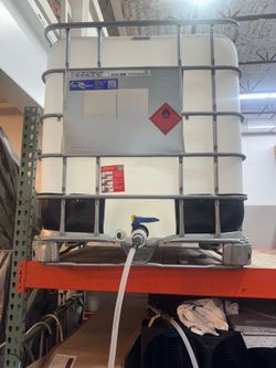 Large 275 gallon tote with metal cage