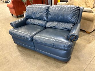 BRADINGTON YOUNG Vintage Storm Blue Leather Manual Recliner with Hidden Levers and Nailhead Trim