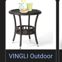 Round outdoor wicker side table