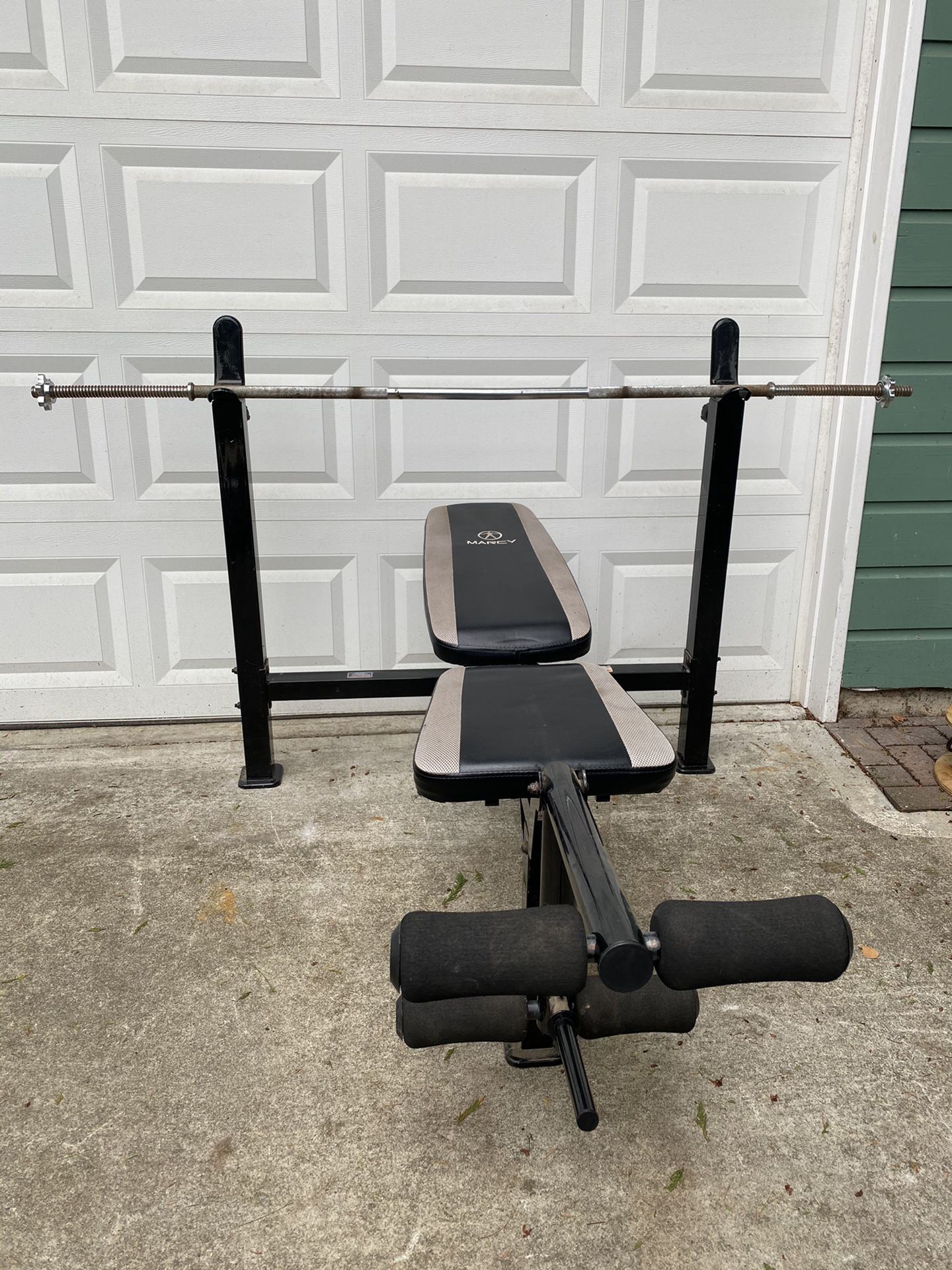 Adjustable bench press with leg developer and 6ft standard bar with screw lock