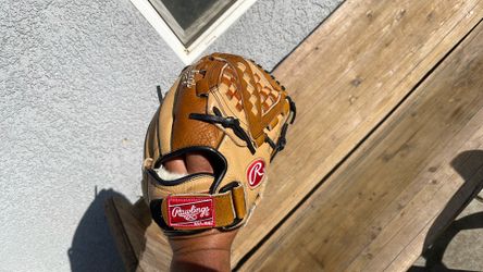 Size 11 .1/2 inches- Rawlings, the gold glove champion series.