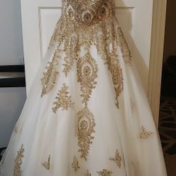 Quinceanera dress, taffeta and gold sequined cream colored ballroom length dress