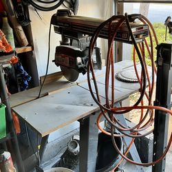 10' Craftsman Radial Saw W/ Stand, Cutting Table, And Extra Blades