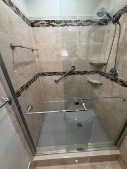 Sliding shower glass doors