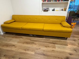 Long yellow sofa