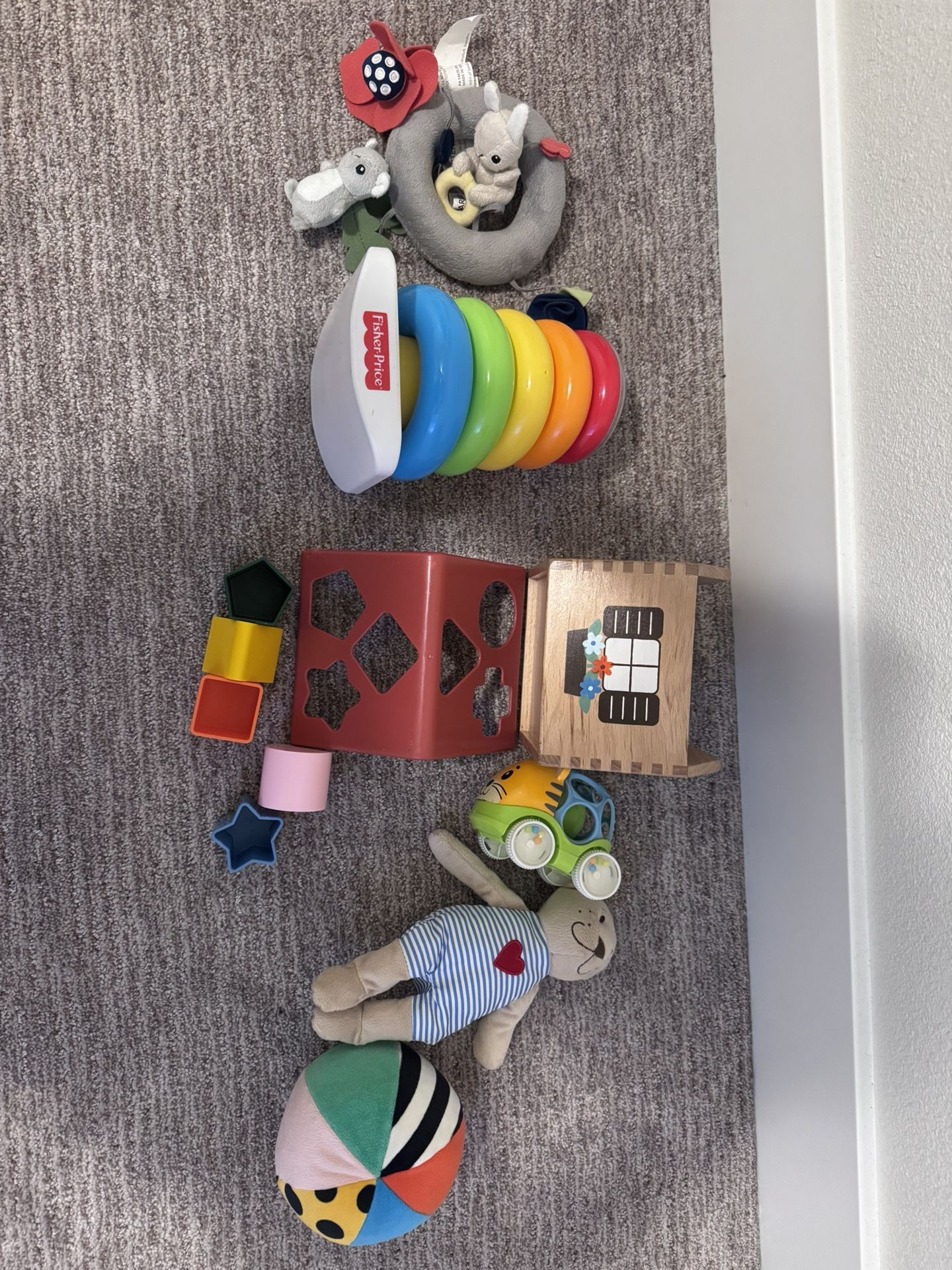 Fisher price stacking tower, Ikea crib mobile, Shape sorter House And IKEA toys