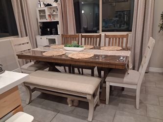 Rustic wood dining table set with 5 chairs and a bench