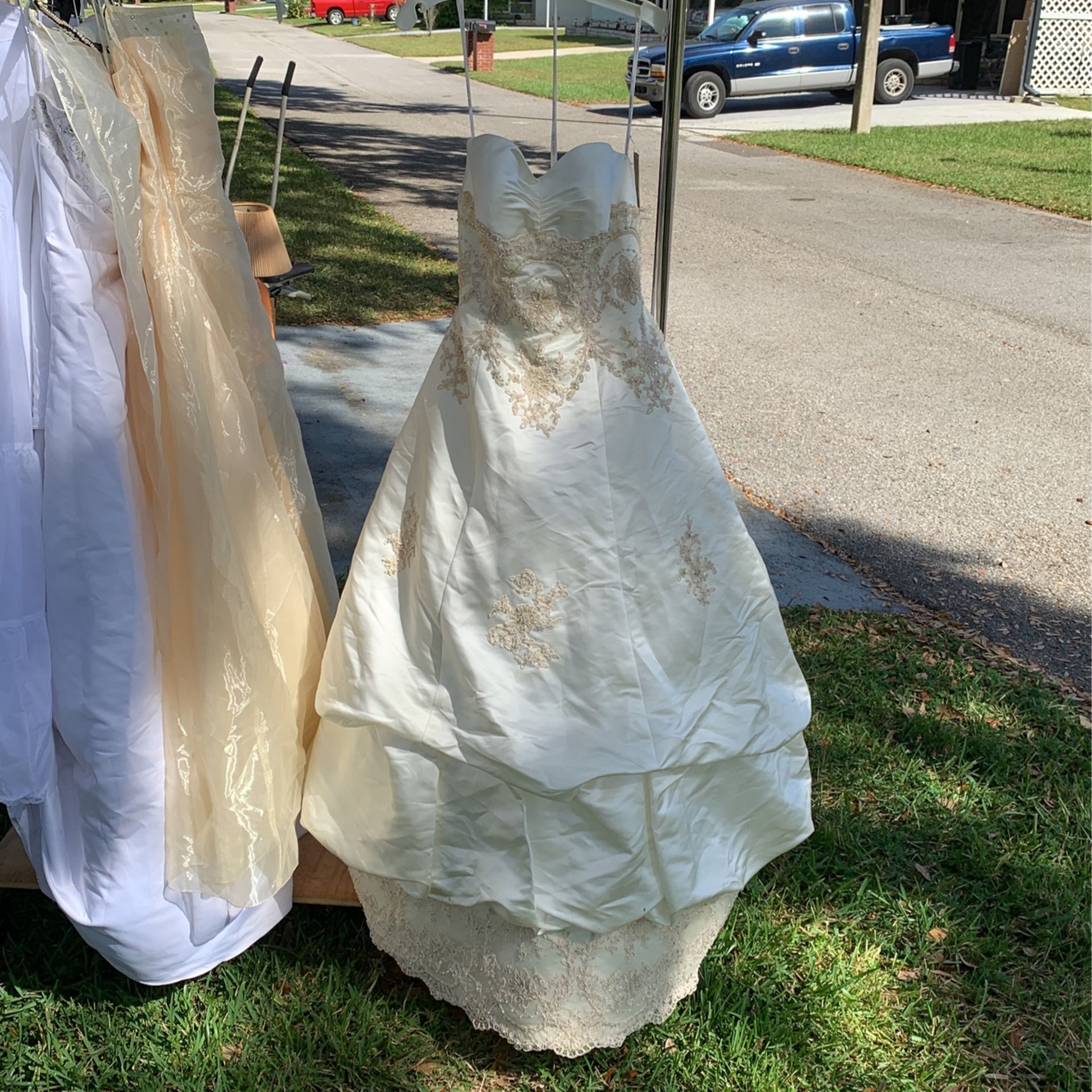 sachin and babi light blue dress Hail Mary to find this discontinued dress by Oleg Cassini :  r/weddingplanning main image 1