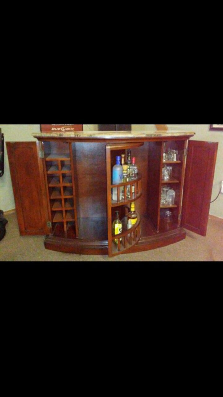 Marble Top Bar With Stools And Glasses