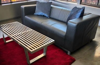 100% leather sofa + retro coffee table