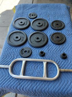 55lbs Standard plates and FREE TRICEP BAR