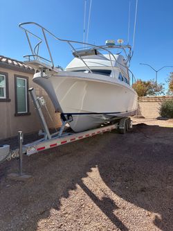 2001 Skipjack 30’ Flybridge Boat