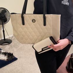 Black and white purse with wallet