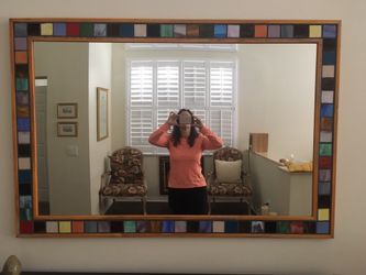 Large mirror with mosaic glass tiles and wood trim