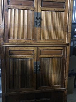 Tall wooden armoire great condition