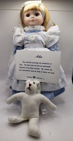 An "Alice" porcelain doll from the Royalton Collection,