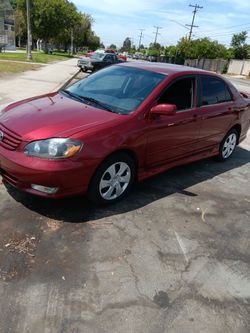 2003 toyota  corolla s titulo limpio
