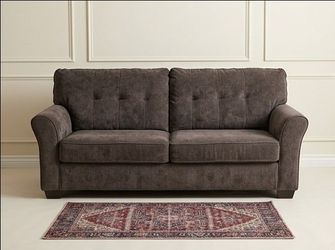Cozy Dark Brown Tufted Sofa - Clean & Comfortable (Delivery Available)