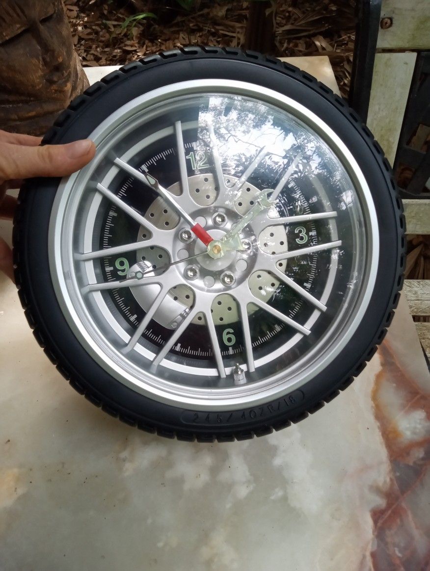 Sterling And Noble Rubber Wheel Clock