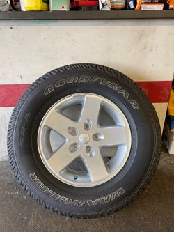 New tire with New Jeep Rim P255/75R17 113S Goodyear Wrangler SR-A 2557517