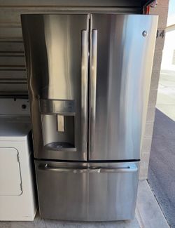 GE Stainless Steel Refrigerator And Freezer