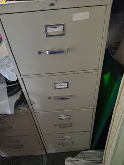 1 52 inch high 4 drawer filing cabinet,  1 29 inch 2 drawer filing cabinet