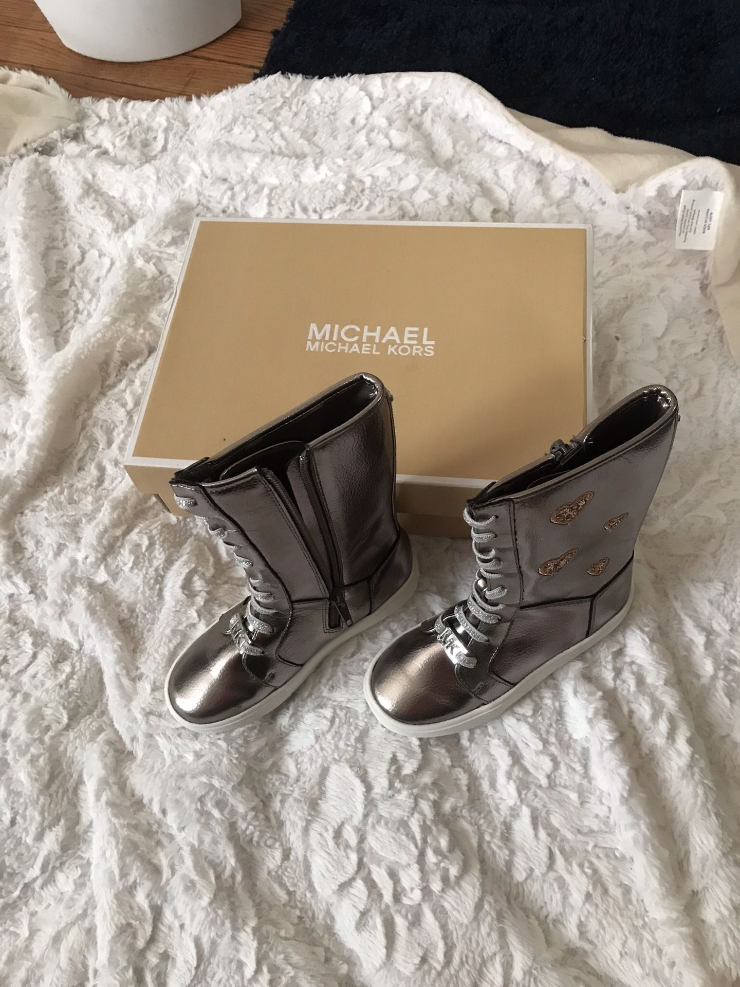 Brand new MK boots. Brand new with box